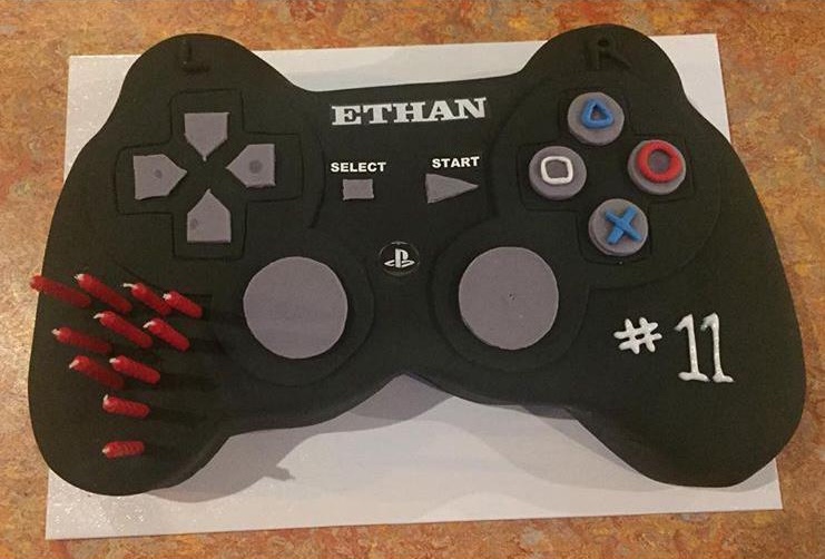 A happy birthday cake with a musical note